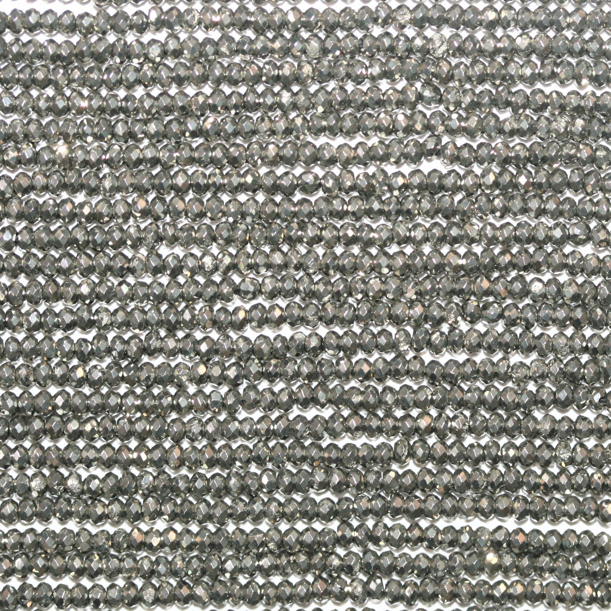 12" St Natural Pyrite Faceted Rondelle Beads 2x1mm.- Strand 32cm.