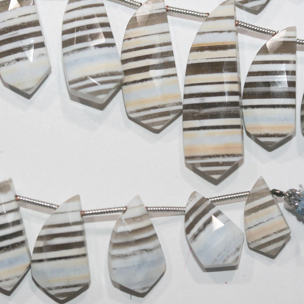 Cuentas de ópalo azul de 8" con facetas degradadas, 32 x 10 mm (aprox.) - 13,5 x 8 mm (tira de 20 cm). Artículo 14949