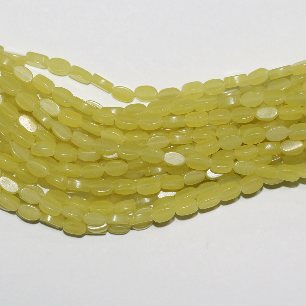 Cuentas ovaladas lisas de serpentina de 16" de St., 6 x 4 mm. Tira de 40 cm.
