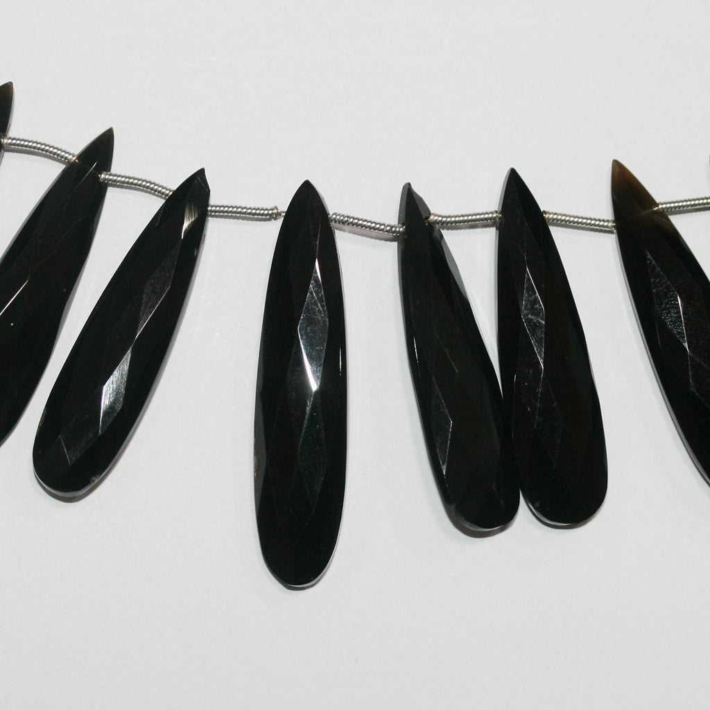 Cuentas de ónix facetado de 7" de St., 40 x 10 mm, hilo de 18 cm.