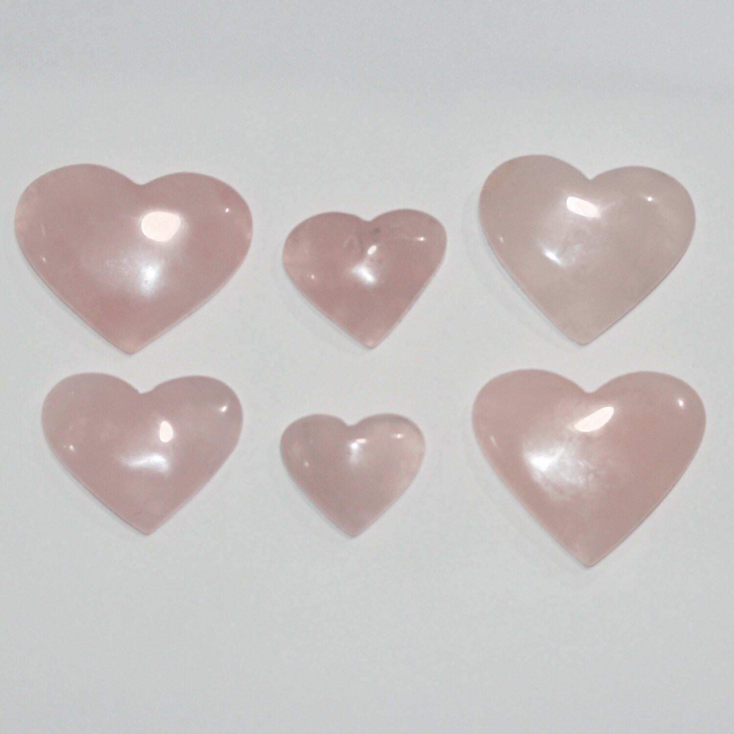 Pendentif cœur lisse en quartz rose sans perçage 20-40 mm.