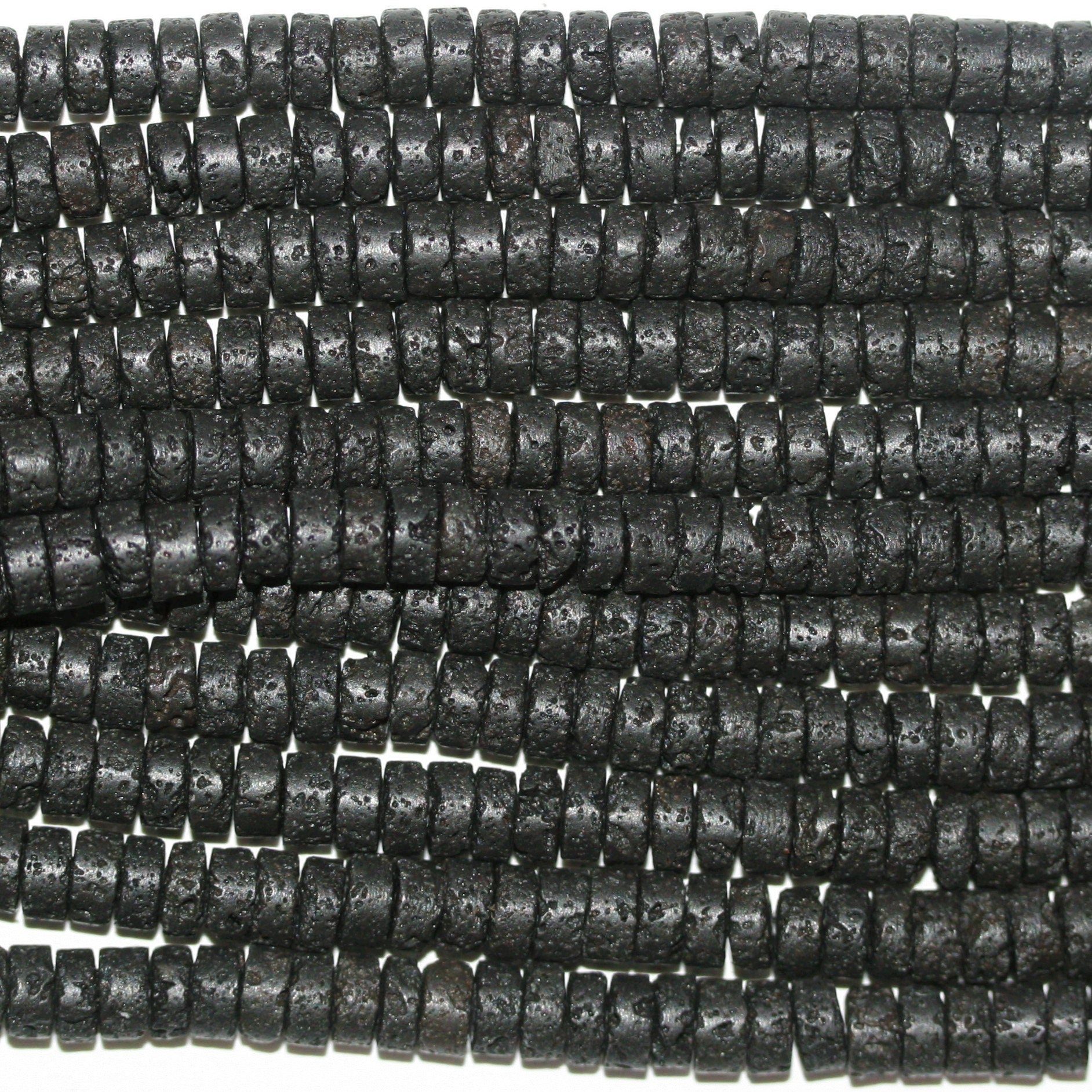 Perles rondelles lisses St. Lava 15" 6x3mm.- Brin 39cm.