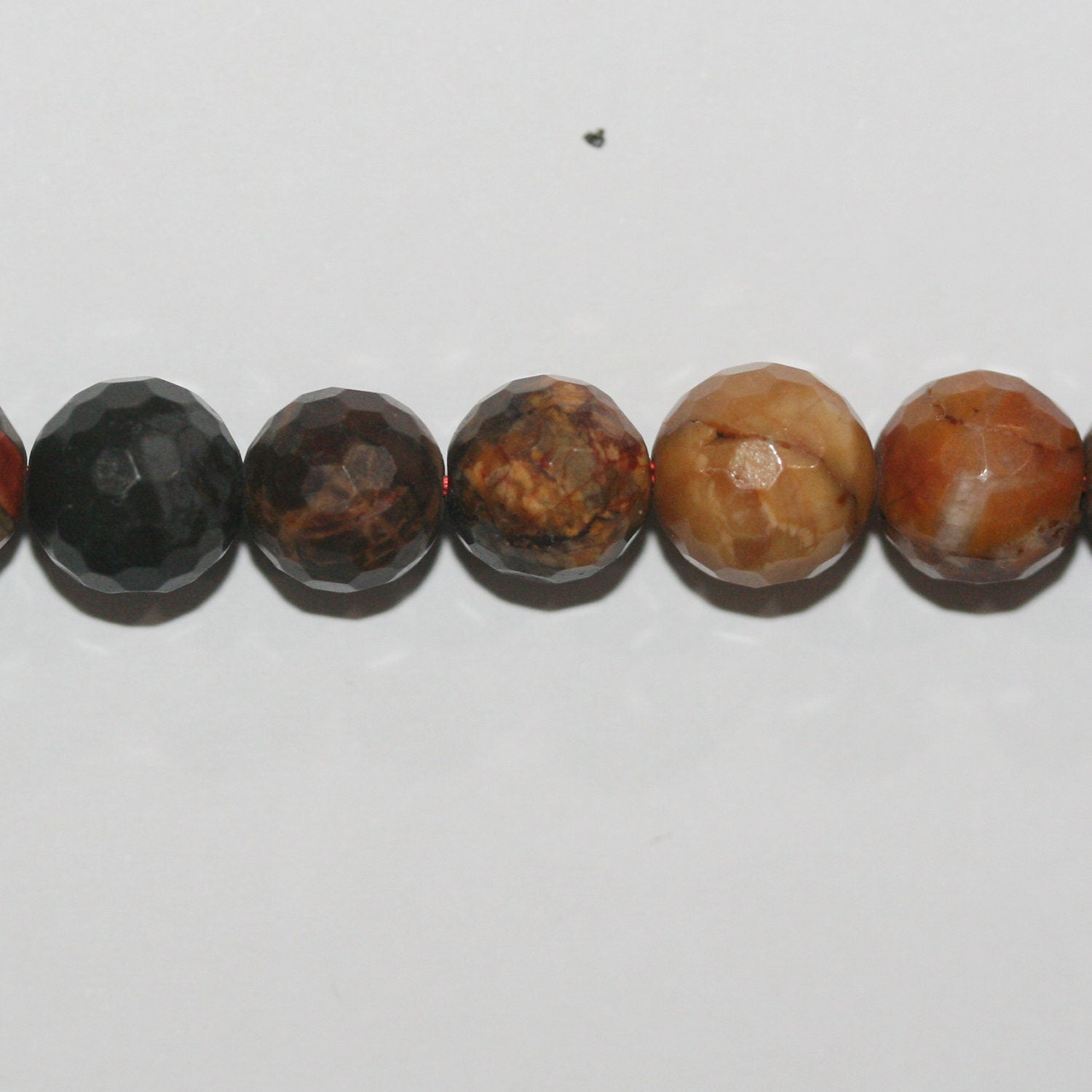 Perles rondes à facettes en jaspe Saint-Picasso, 14 pouces (6 mm) - Fil de 38 cm