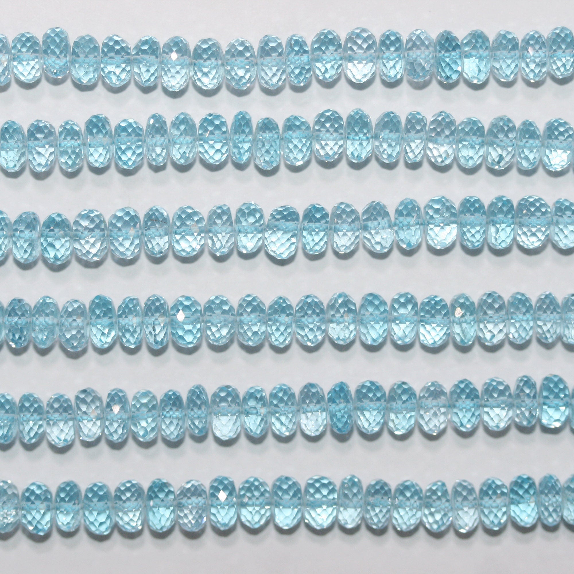 Cuentas redondas facetadas de topacio blanco de 43 cm (17"), 6,5 x 3,5 mm (tira de 45 cm)