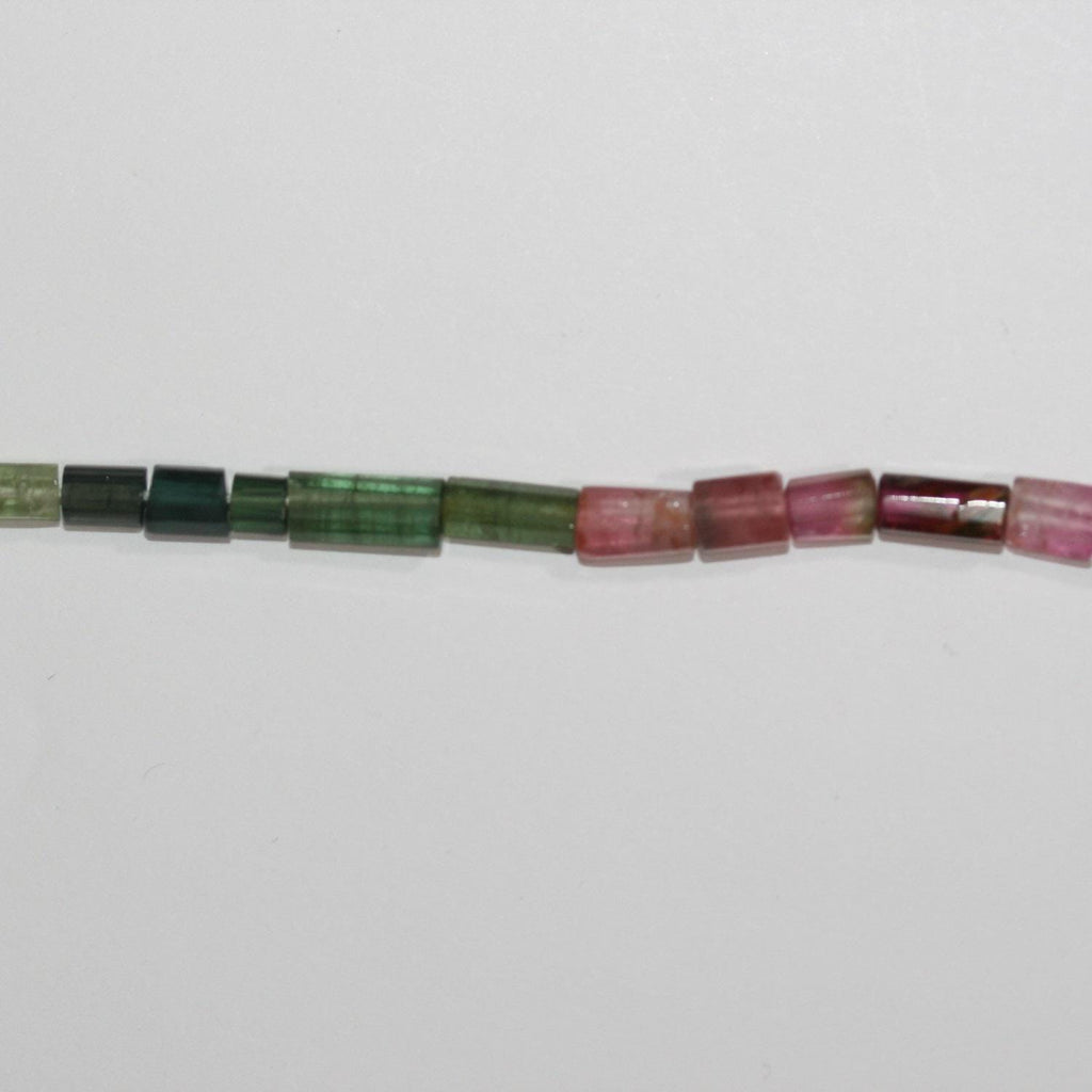 Perles tubulaires à facettes en tourmaline St de 14 pouces, 7 x 4 mm. - Longueur approximative : 37 cm.