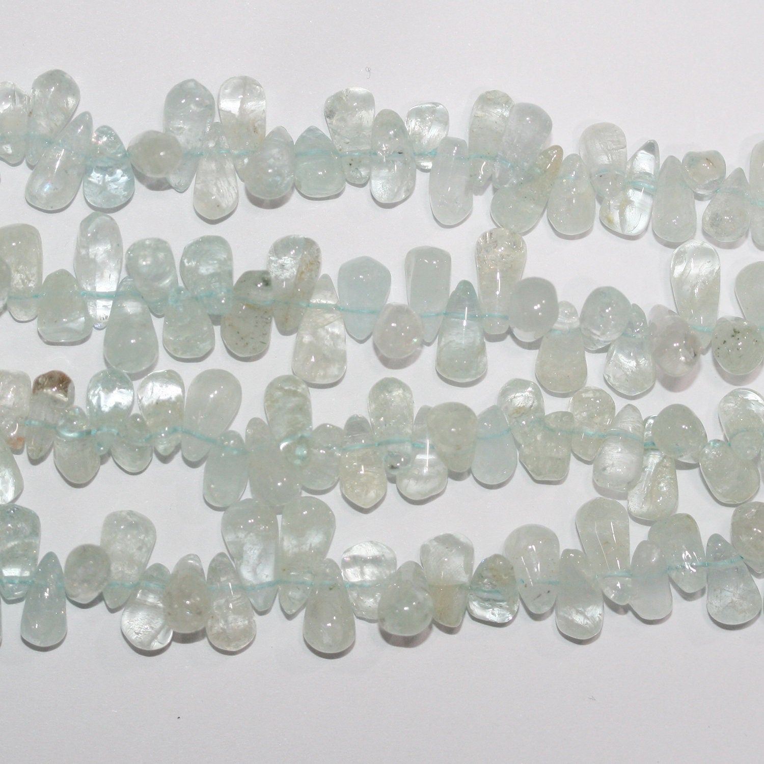 Cuentas lisas de aguamarina de 3" de largo, 8 x 5 mm. Aprox. - Hilo de 35 cm.