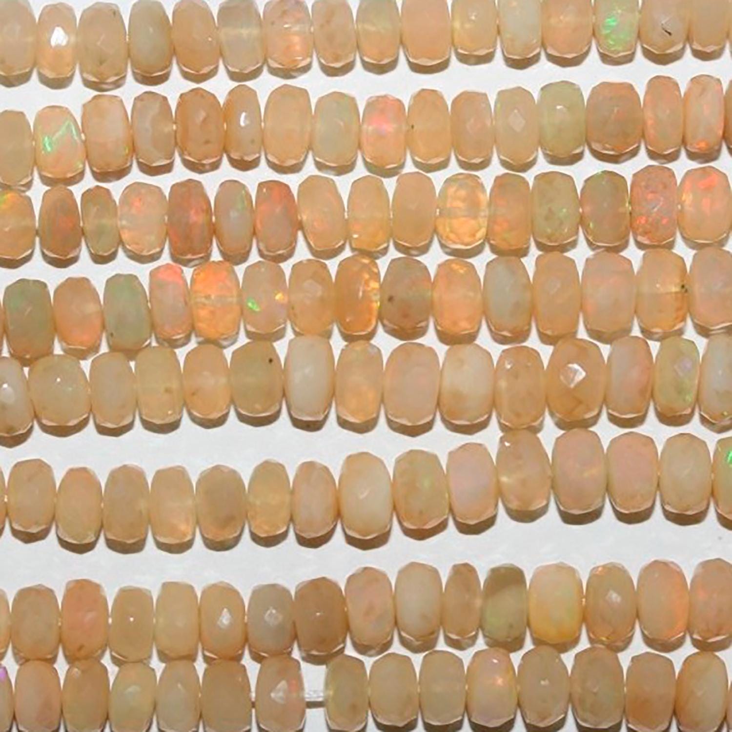 Perles rondelles à facettes graduées en opale éthiopienne St de 40 cm (16 pouces), dimensions approximatives : 4 x 2 à 6 x 4 mm. Longueur du fil : 40 cm environ.