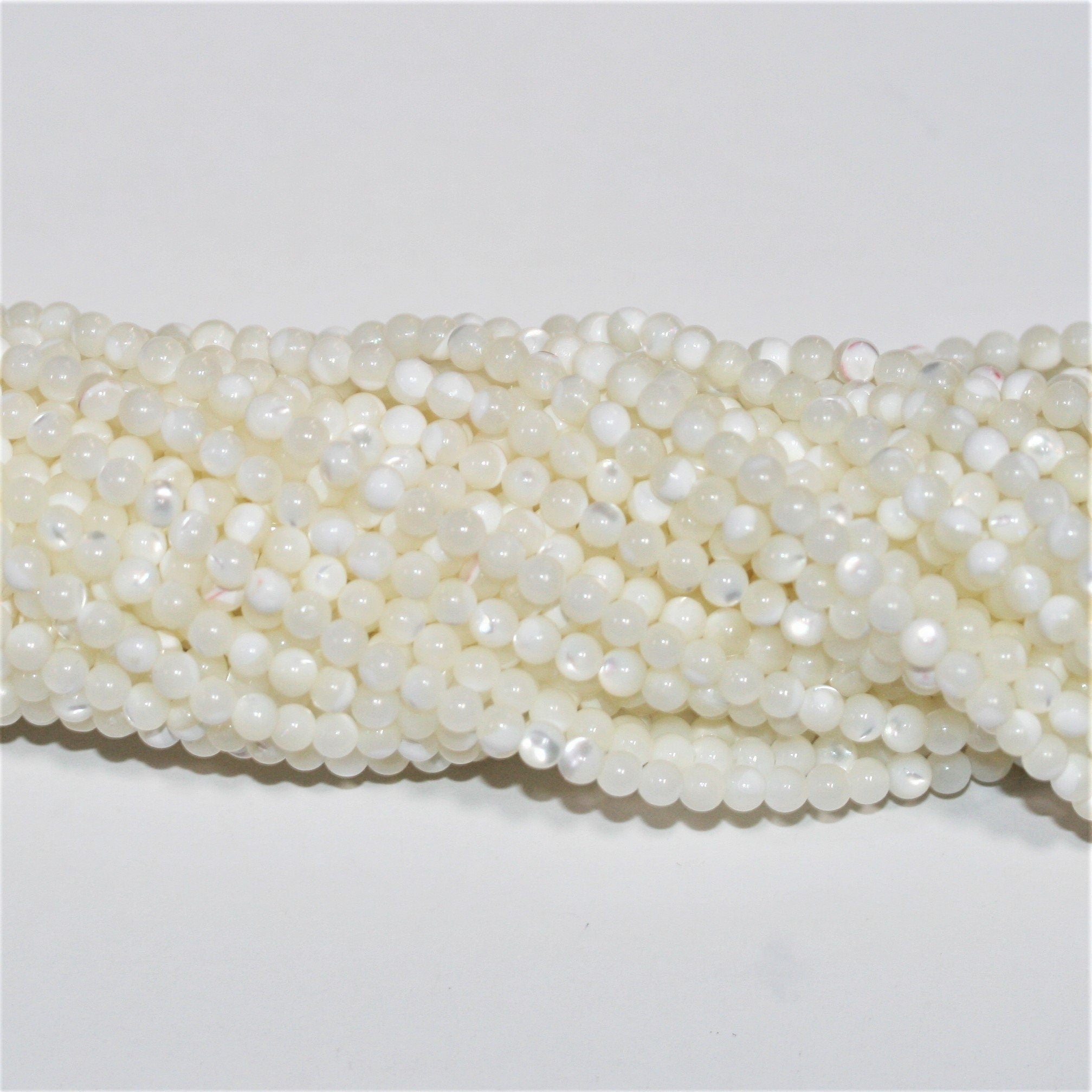 15" St MOP perles rondes lisses 3 mm.-Rig 38 cm.