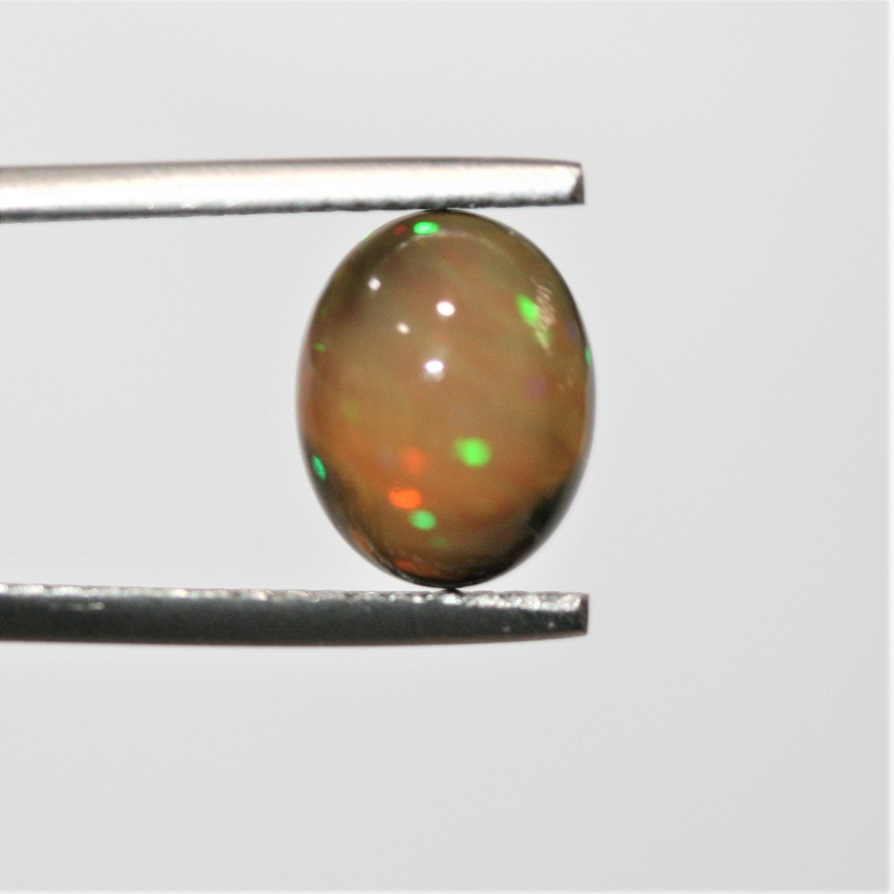 1 Pair of Ethiopian Opal Smooth Oval Cabochon 10x8mm.- 2 Pcs