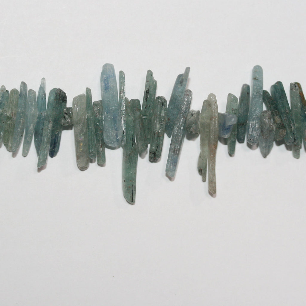 Perlas de cianita santa de 16", acabado mate, sin pulir, de 25 a 18 x 5 mm, aprox., hilo de 40 cm.