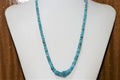 Collier en turquoise St lisse dégradée de 15 pouces (38 cm), 15 x 3 à 5 x 2 mm. Longueur approximative : 38 cm.