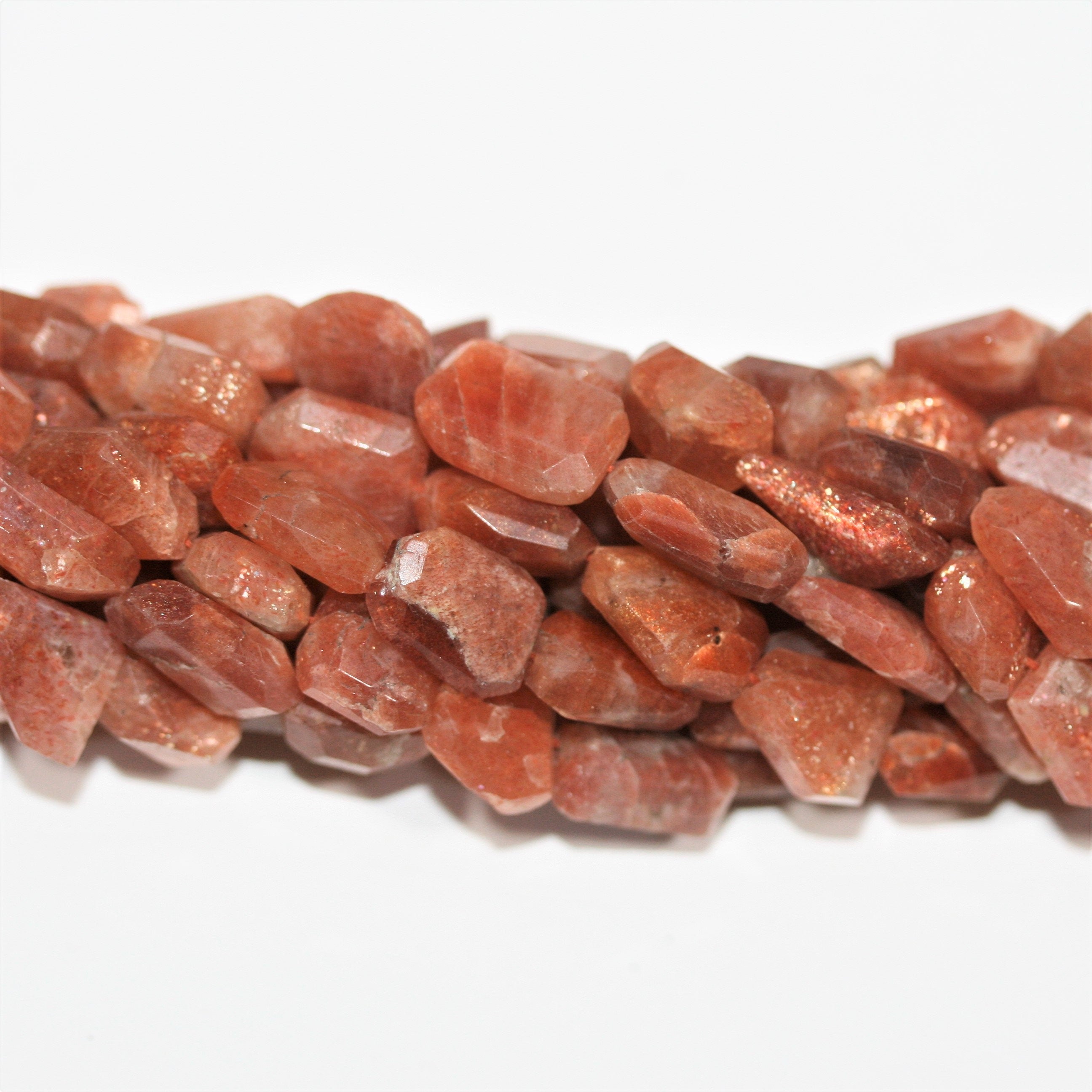 13" St Sun Stone Faceted Nugget Beads 10-15mm. Approx.- Strand 33cm.