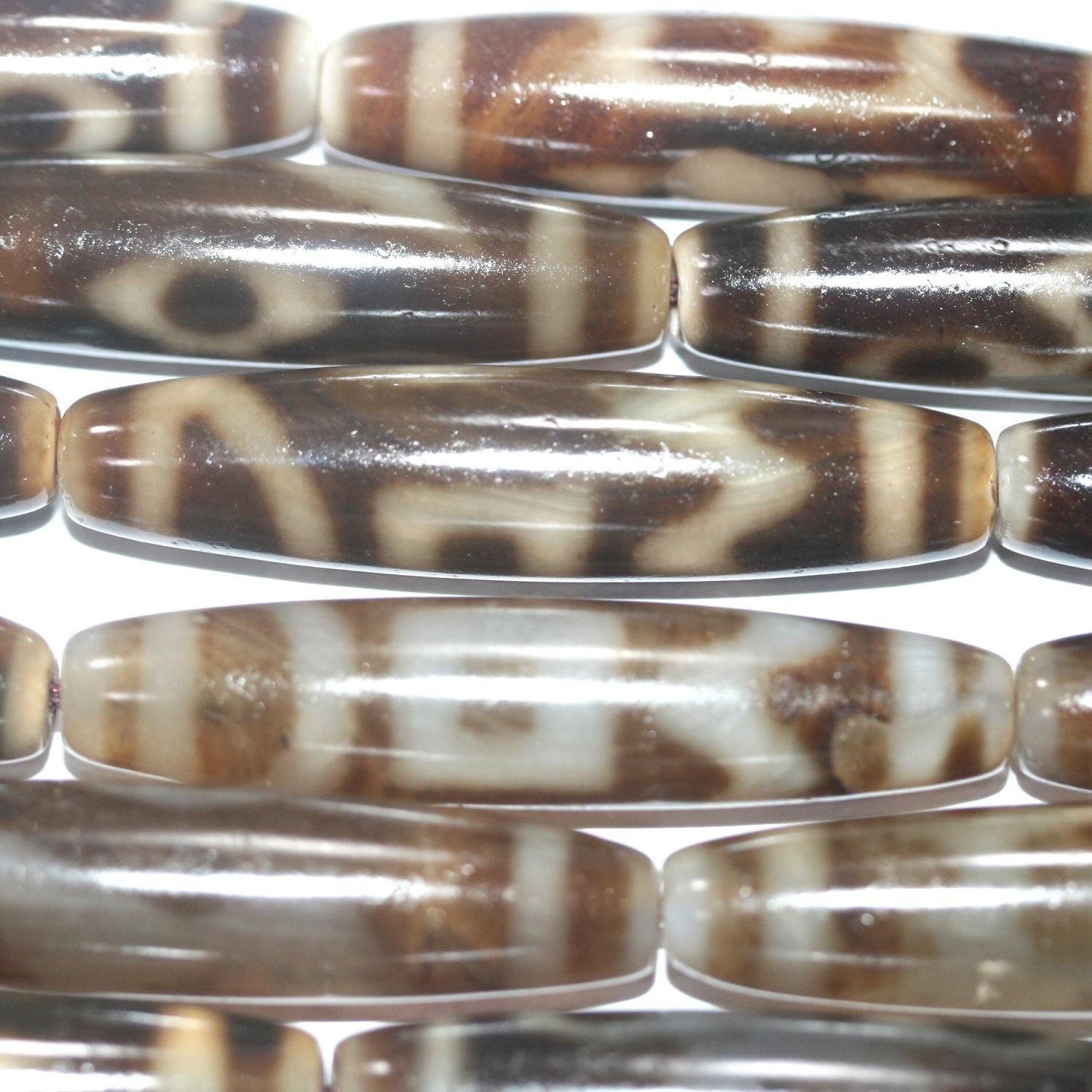 Cuentas de barril liso de ágata marrón de 16", 57 x 13 mm aprox. - Hilo de 40 cm.