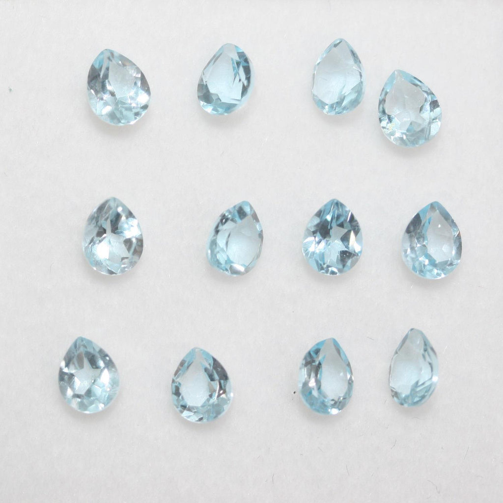 12Pcs Lot Sky Topaz Drop Faceted 5x4mm (12 pcs).