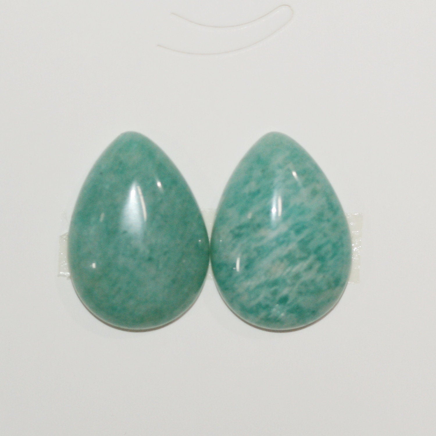Lote de 2 cabujones de amazonita lisos de 25 x 18 mm. (2 piezas)
