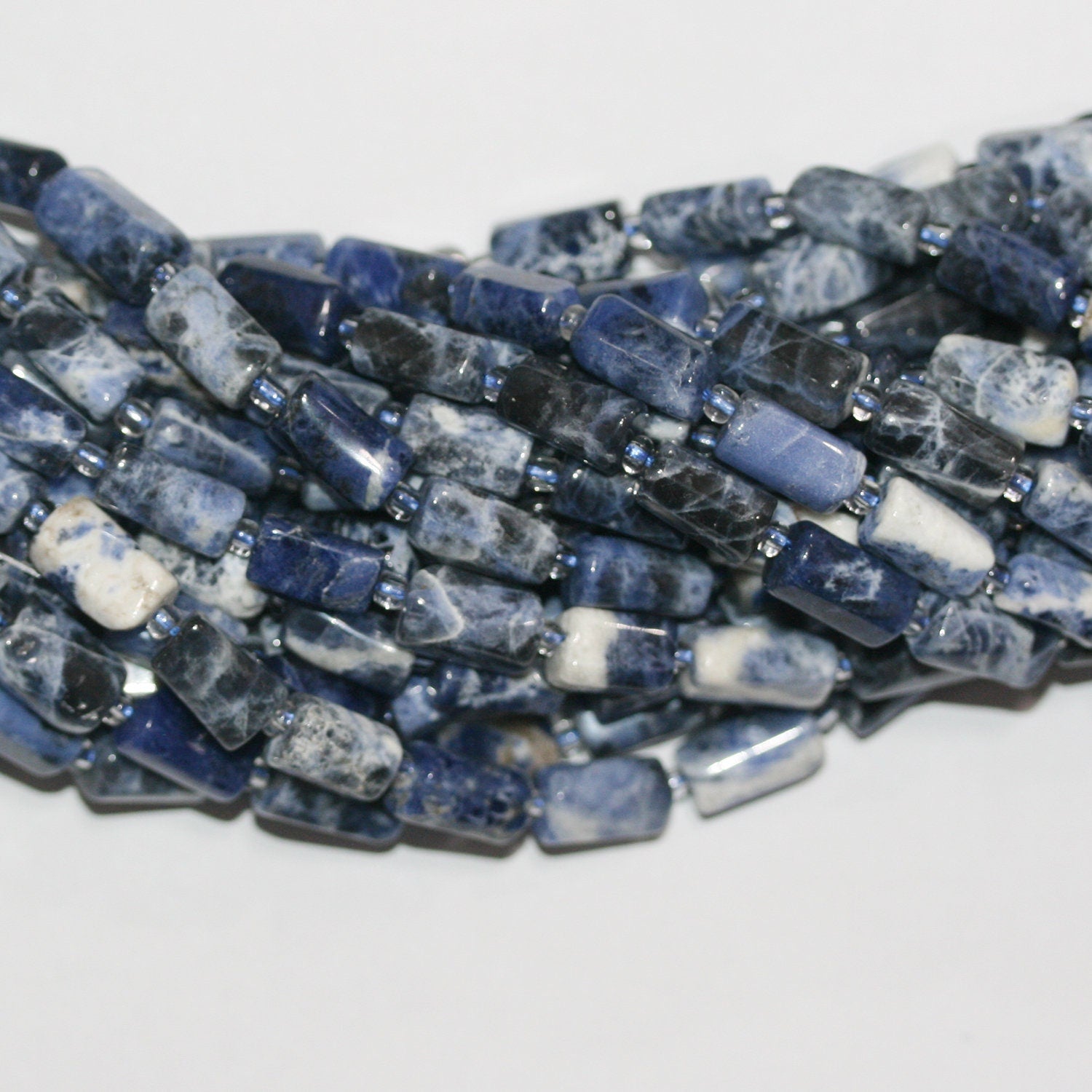 Cuentas de barril lisas de sodalita de 16", 12 x 6 mm. Aprox. - Hilo de 40 cm.