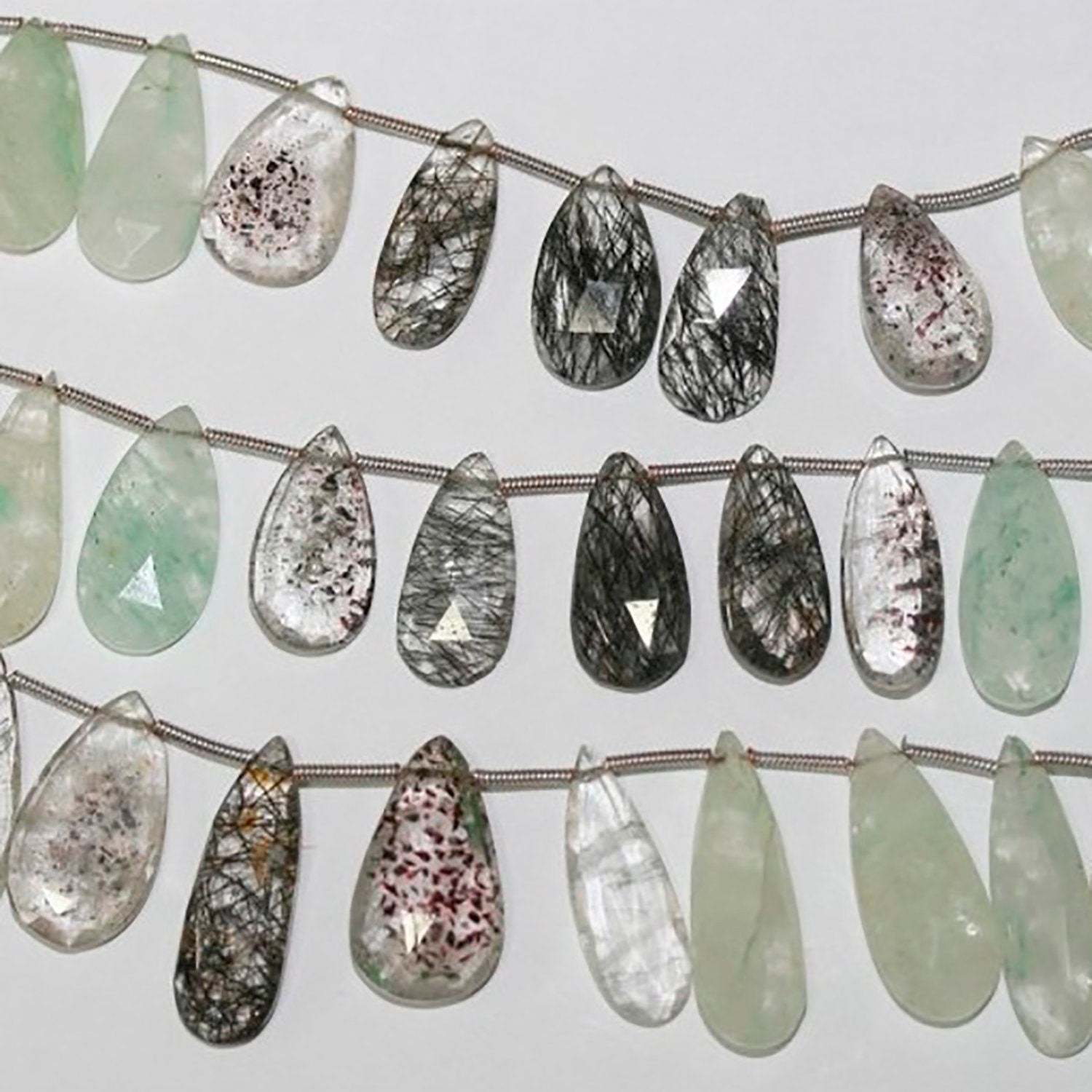 Cuentas de cuarzo rutilado multicolor, facetadas y graduadas, de 19 x 11 mm (7"), aprox., tira de 20 cm