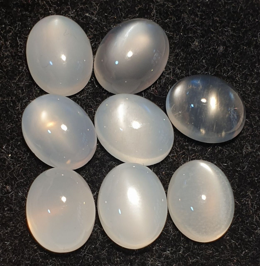 Lote de 8 cabujones ovalados de piedra lunar de ojo de gato blanco de 10 x 8 mm. (8 piezas)