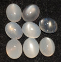 Lote de 8 cabujones ovalados de piedra lunar de ojo de gato blanco de 10 x 8 mm. (8 piezas)