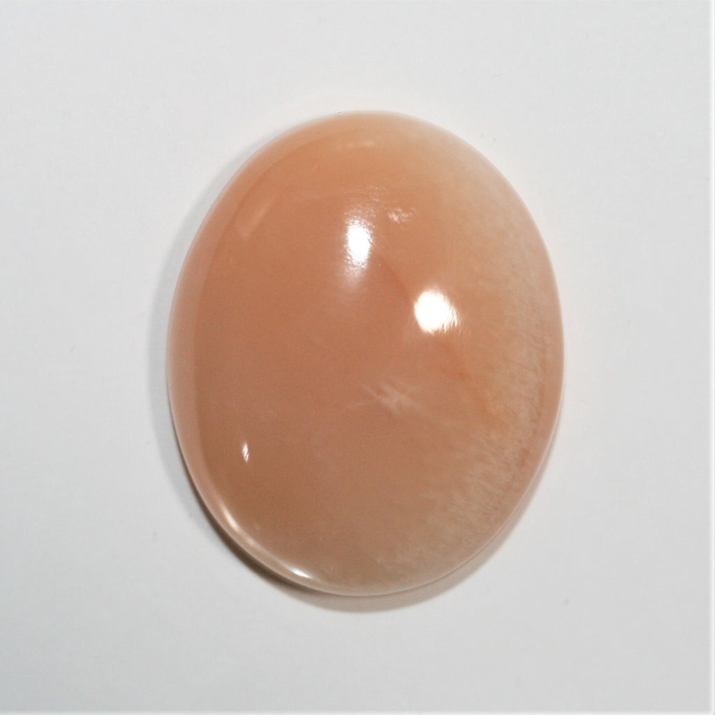 Gros cabochon ovale en pierre de lune pêche, 30 x 24,5 mm (50,78 ct) - Pierre de collection, fournisseur de pierres rares - Gemmes naturelles