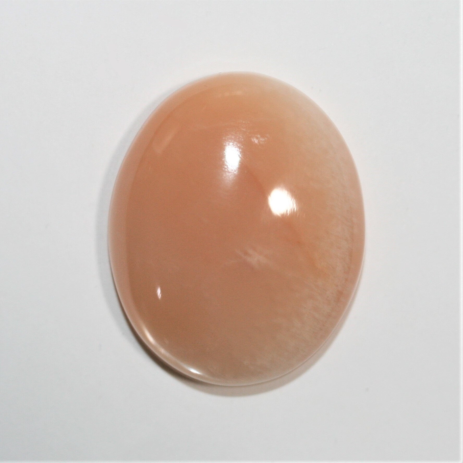 Gros cabochon ovale en pierre de lune pêche, 30 x 24,5 mm (50,78 ct) - Pierre de collection, fournisseur de pierres rares - Gemmes naturelles