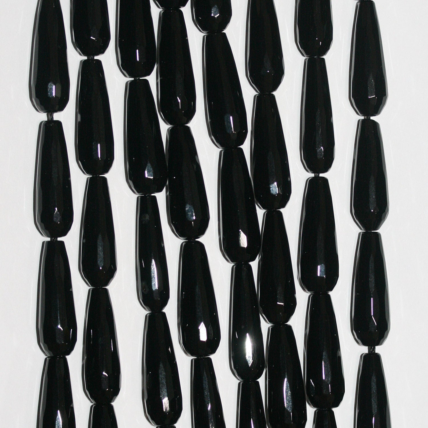 Cuentas facetadas de ónix St. de 16", 30 x 10 mm, hilo de 40 cm.