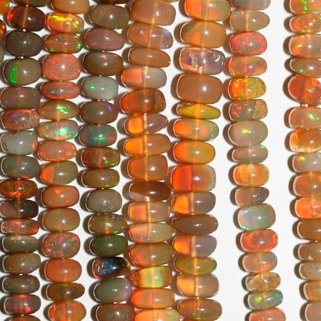 Perles rondelles lisses et graduées en opale éthiopienne, 40 cm (16 pouces), dimensions : 4 x 2,5 à 6 x 4 mm. Longueur du fil : environ 40 cm.