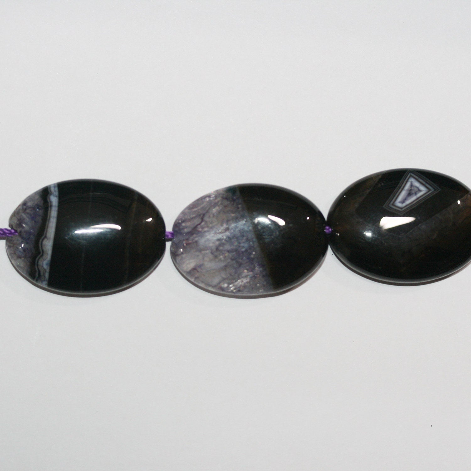 Cuentas ovaladas lisas de ágata morada de 16" (35 x 25 mm, aprox.) - Hilo de 40 cm