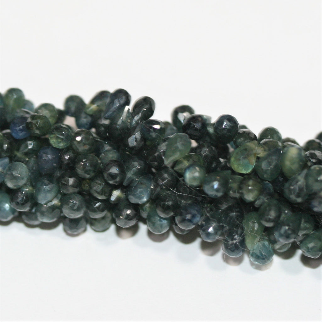 Perles en forme de goutte facettées en saphir vert bleuâtre de 9 pouces (environ 6 x 4 mm). Longueur du fil : 23 cm.