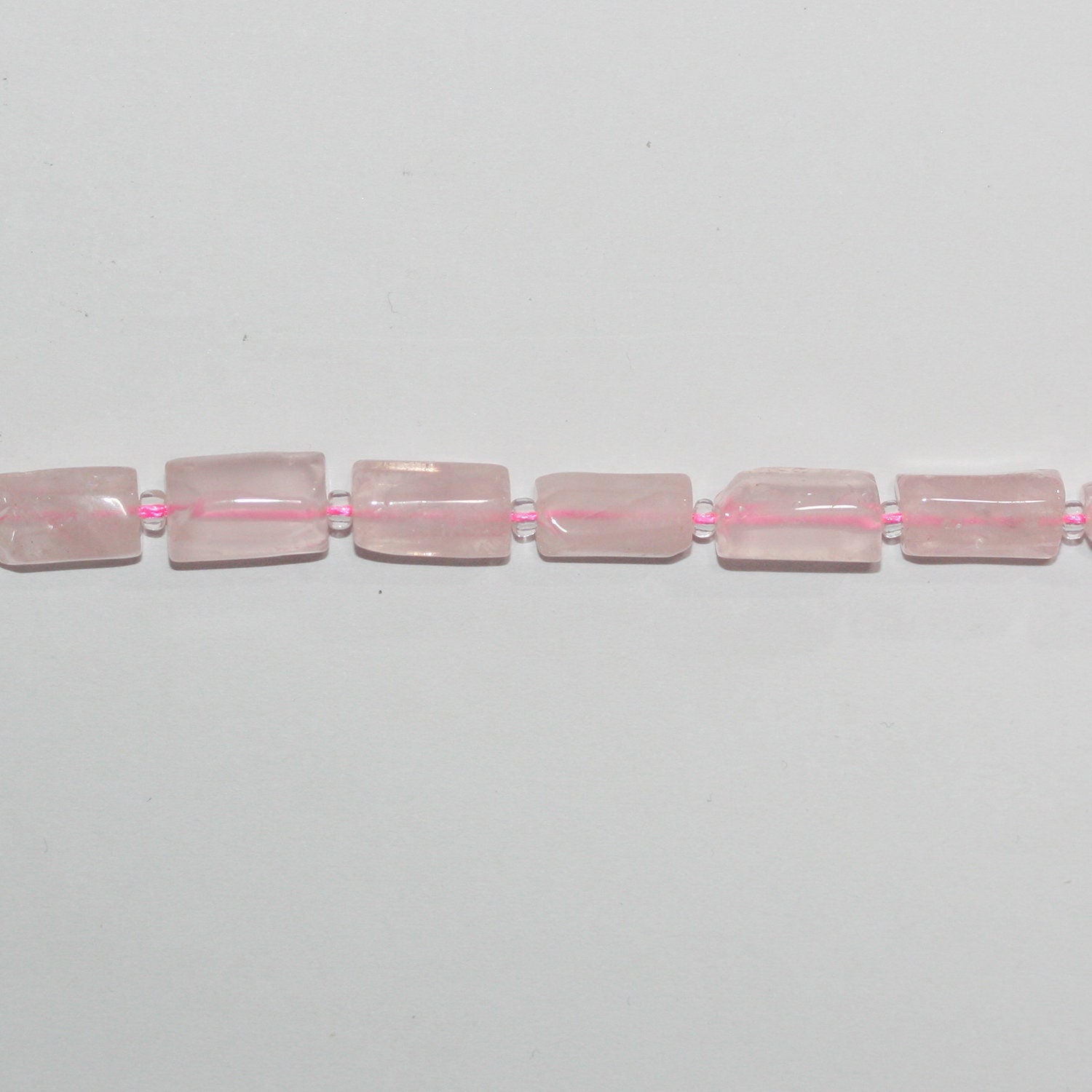 Cuentas de cuarzo rosa de 40 cm (16"), barril liso, 12 x 6 mm. Aprox. - Tira de 40 cm.