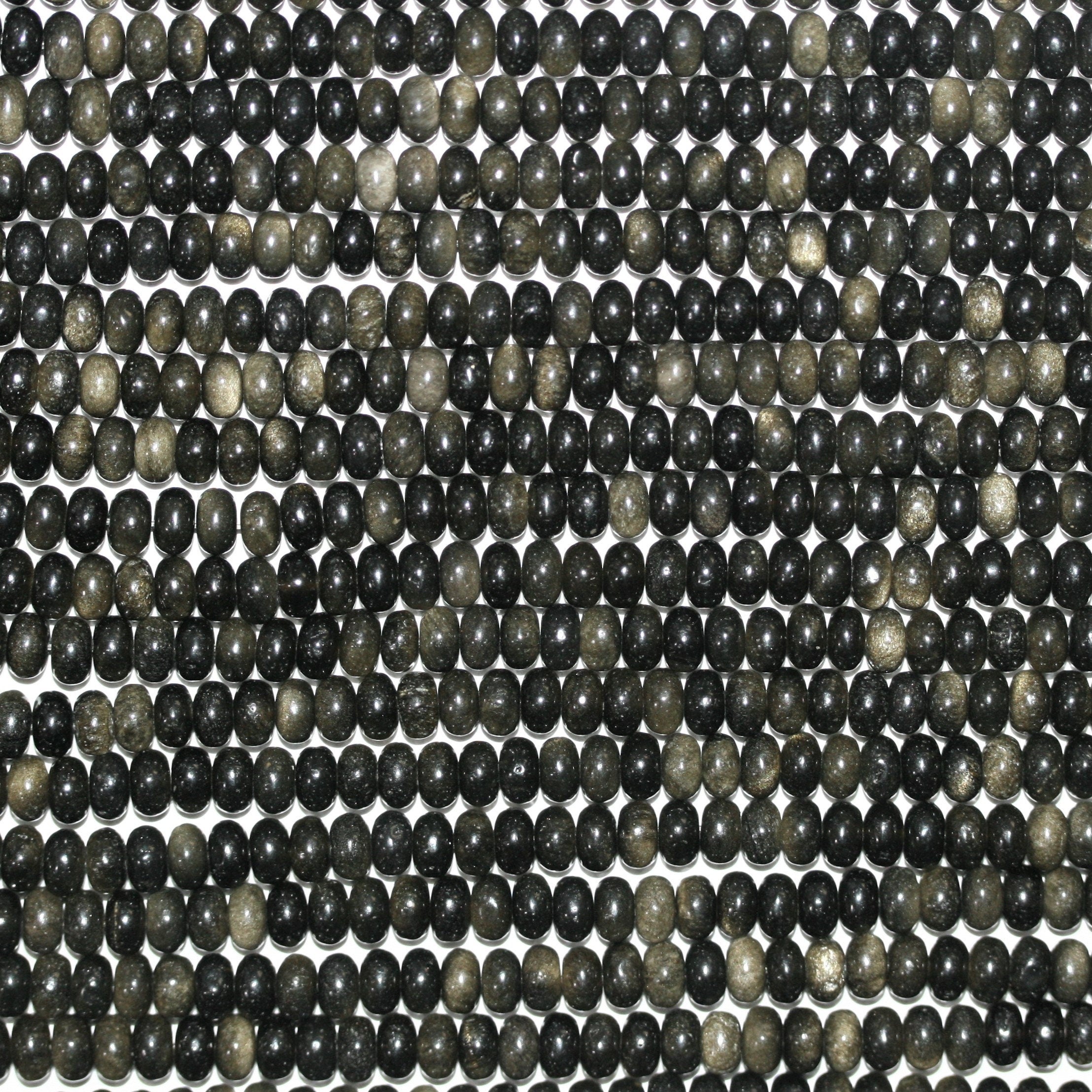 Perles rondelles lisses en obsidienne St 15" 6x4mm.- Brin 39cm.