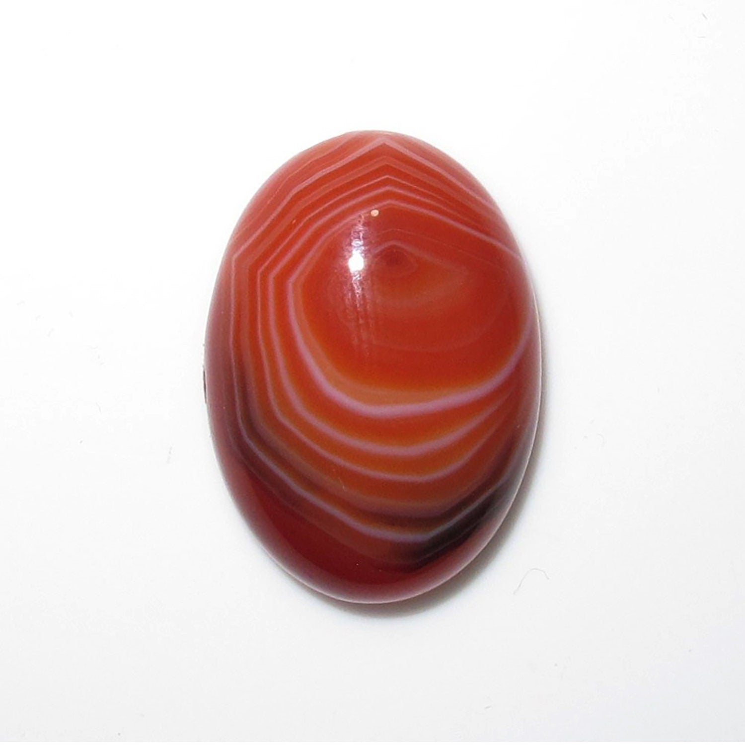 Lote de 2 cabujones ovalados de ágata rayada naranja de 25 x 18 mm. (2 piezas)