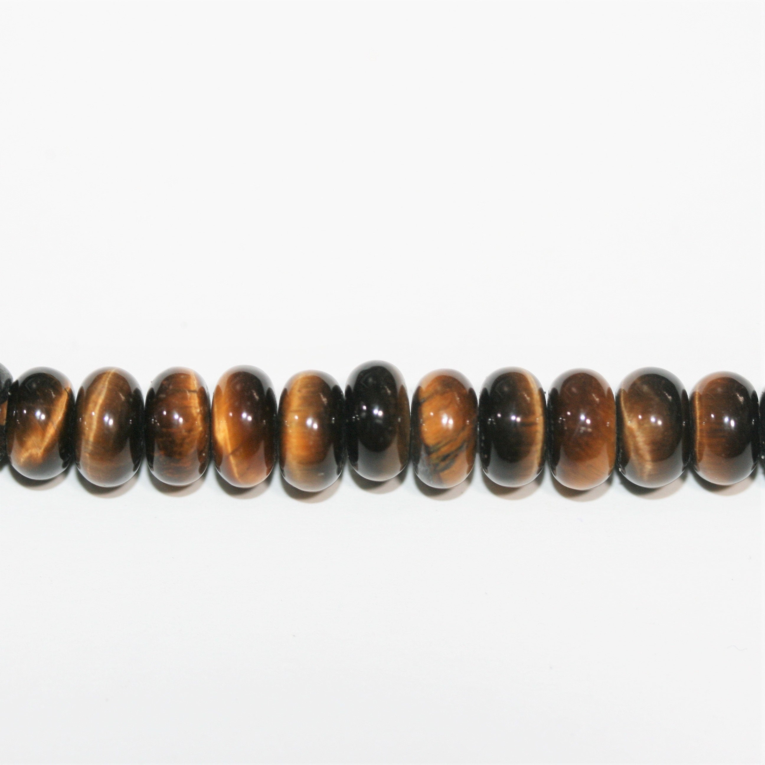 Perles rondelles lisses œil de tigre St 15" 8x4mm.- Brin 38cm.