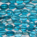 Perles ovales lisses en quartz bleu St, 10 x 8 mm environ, longueur 40 cm.