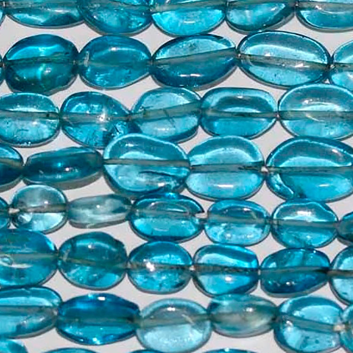 Perles ovales lisses en quartz bleu St, 10 x 8 mm environ, longueur 40 cm.