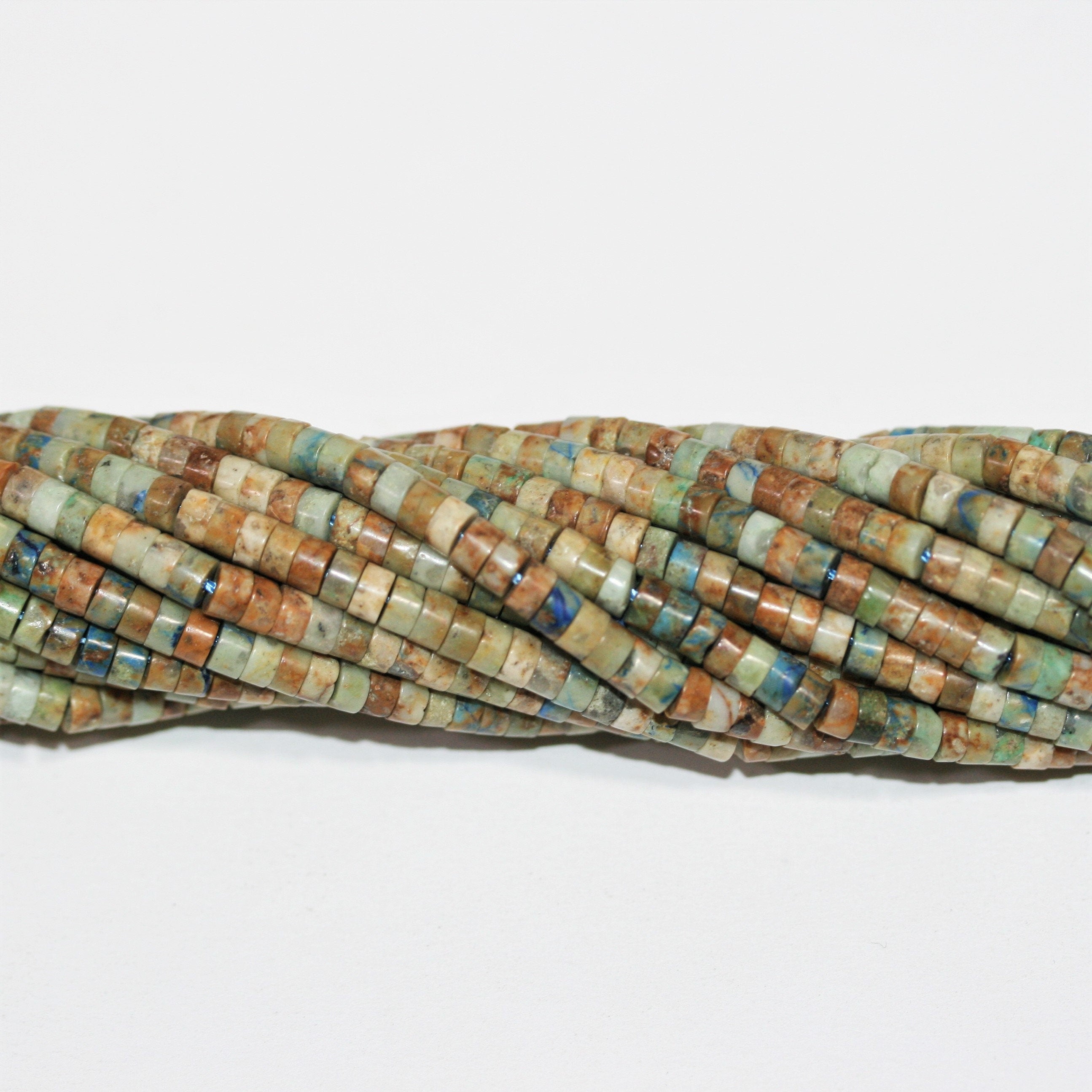 Perles disques lisses en chrysocolle St 15" 4x2mm.- Brin 39cm.