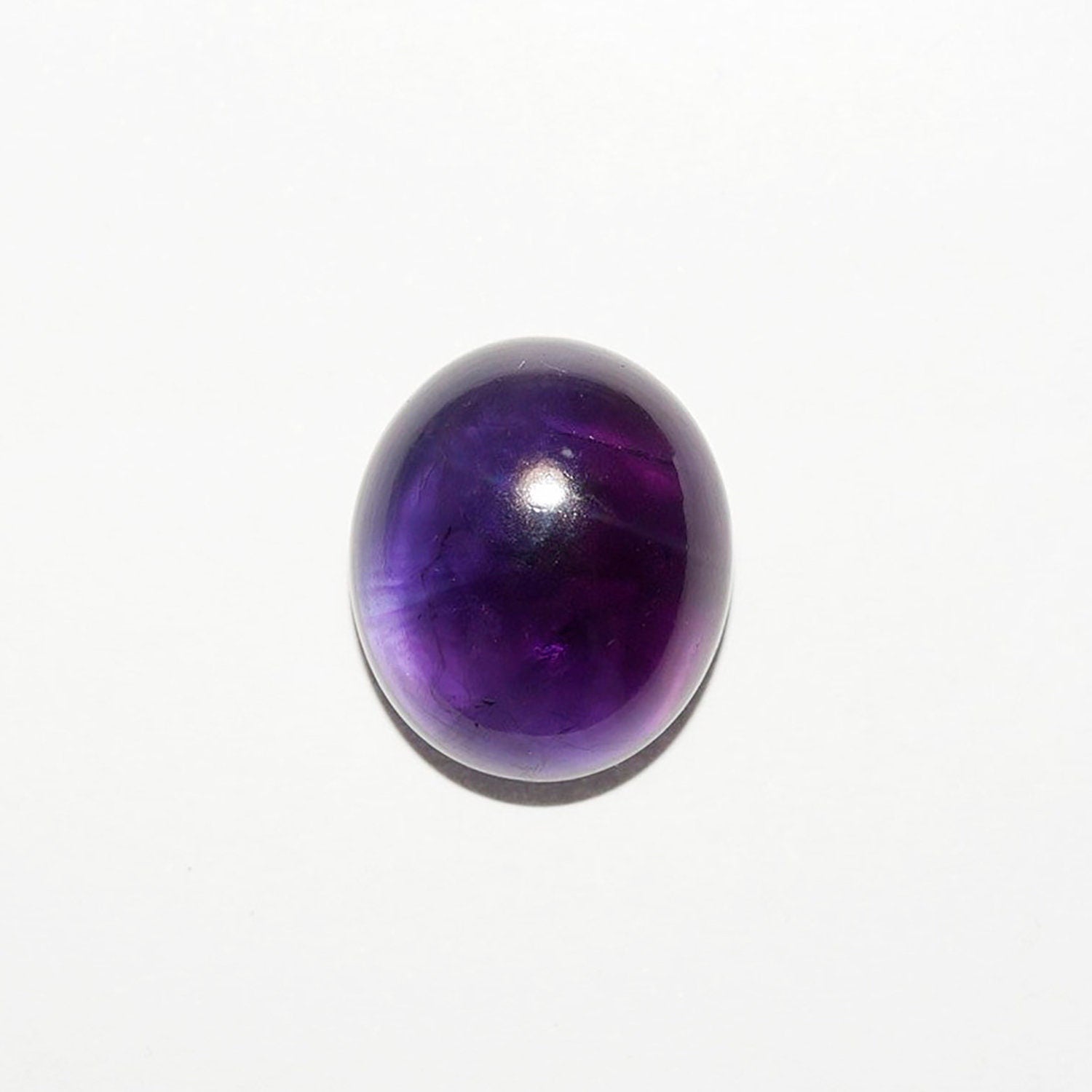 Lote de 4 cabujones ovalados de amatista de 14 x 12 mm. (4 uds.)