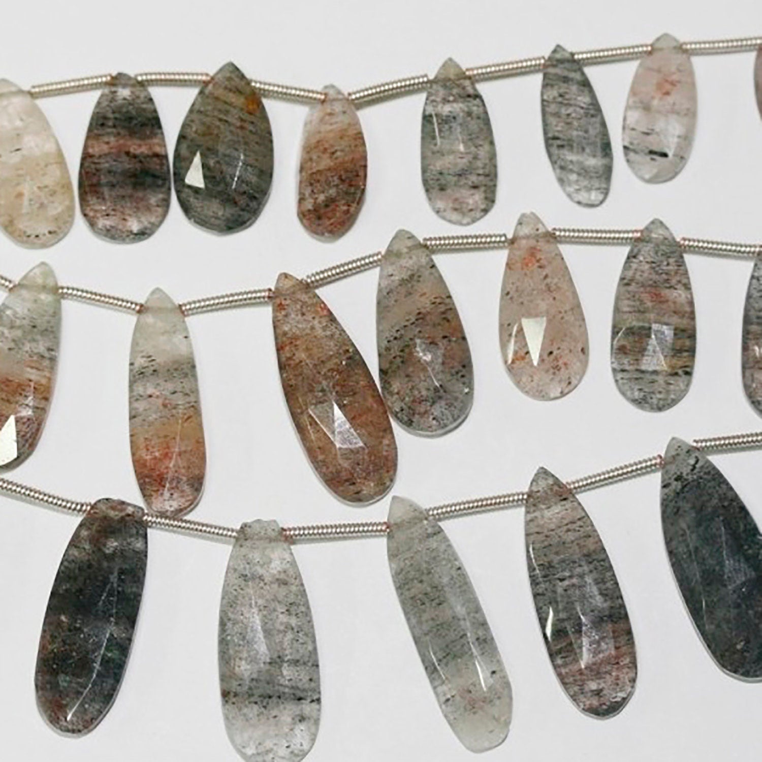 Cuentas de cuarzo rutilado multicolor facetadas de 7" (25 x 10 mm, aprox.), tira de 20 cm