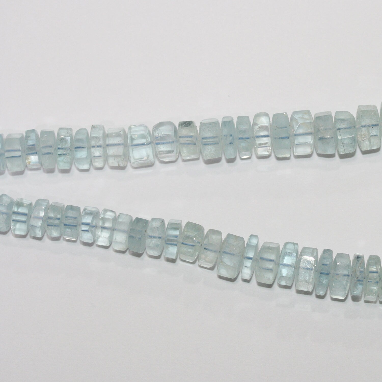 Collier rondelle à facettes dégradées en aigue-marine 5x2 - 12x4mm.Approx.