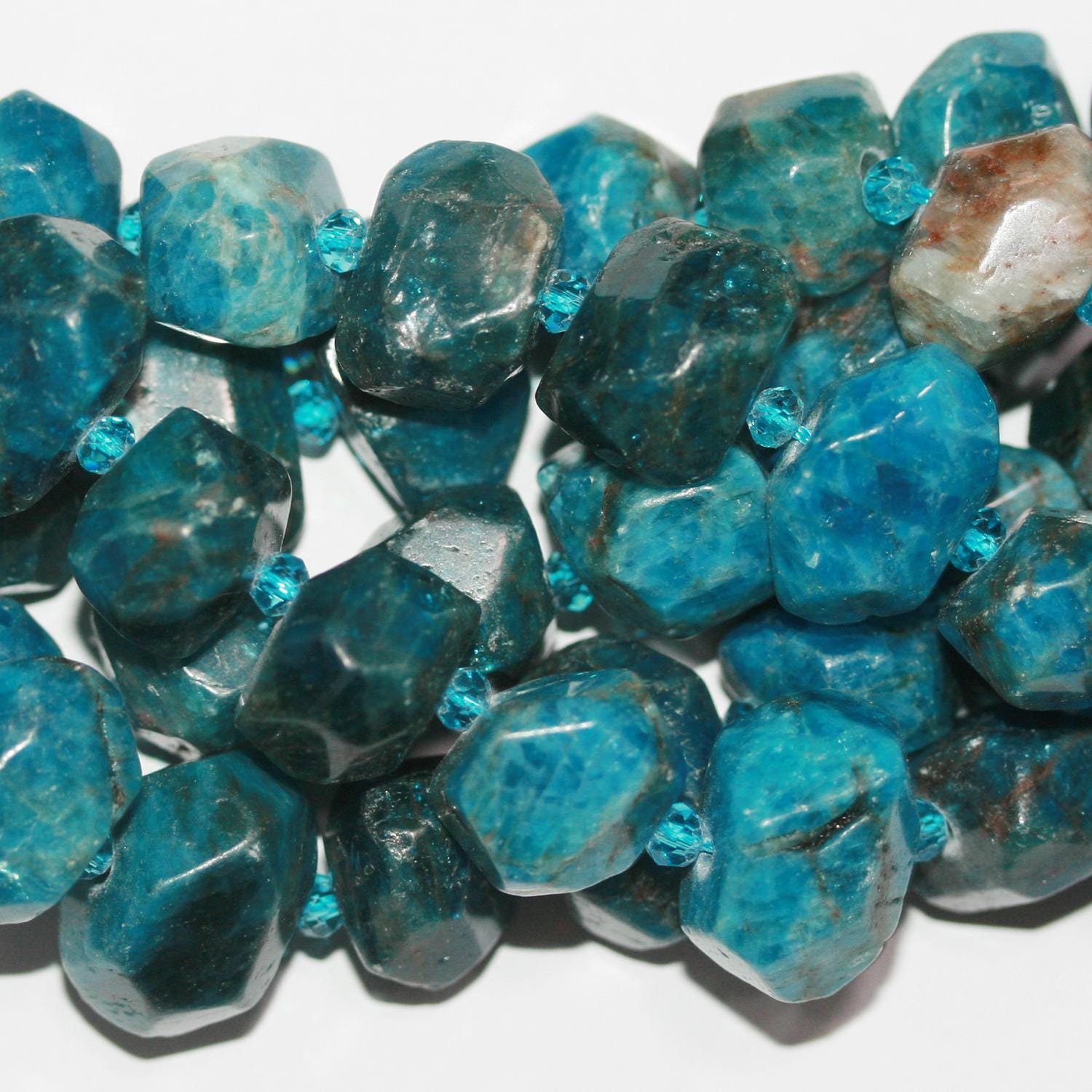 Cuentas facetadas de apatita azul cielo de 16" (16 x 11 mm). Hilo de 40 cm aprox.