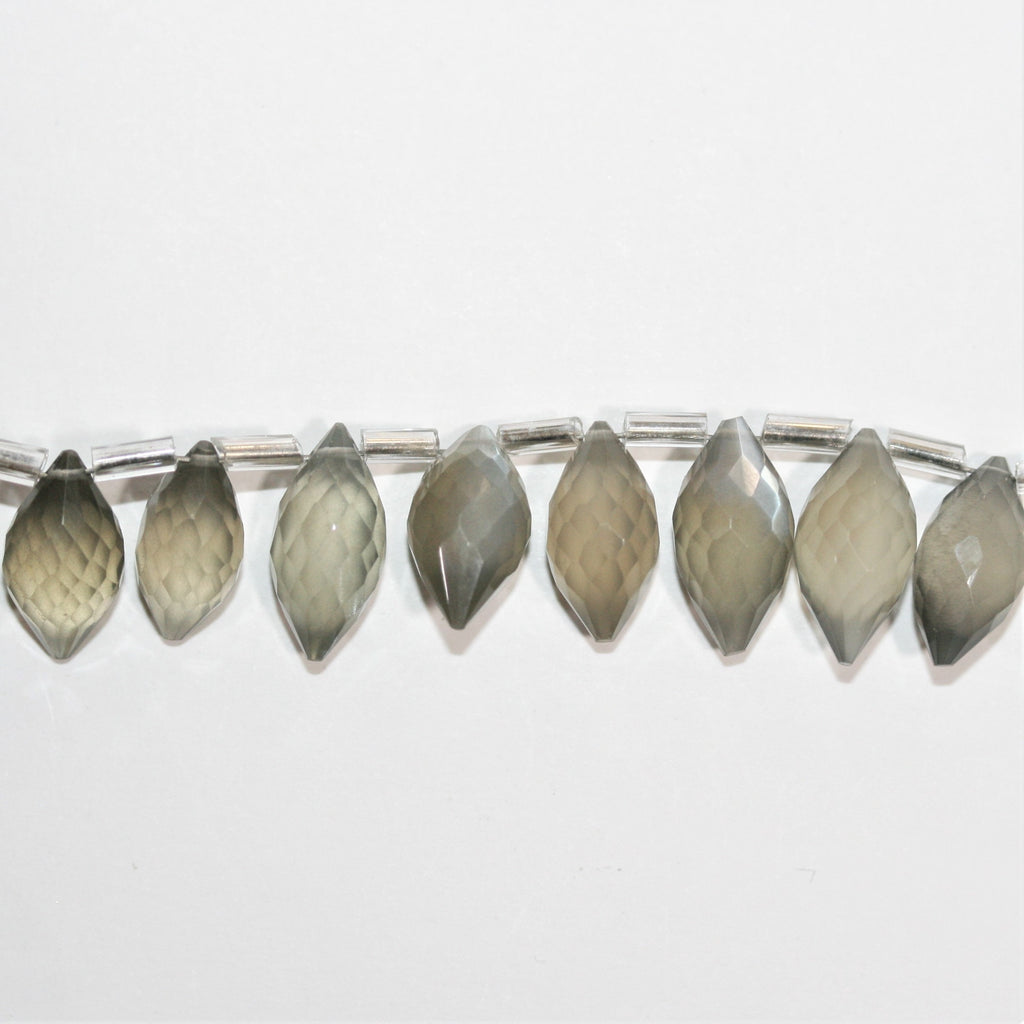 Cuentas de piedra lunar gris St. facetadas de 7", 12 x 7 mm. Aprox. - Hilo de 18 cm.