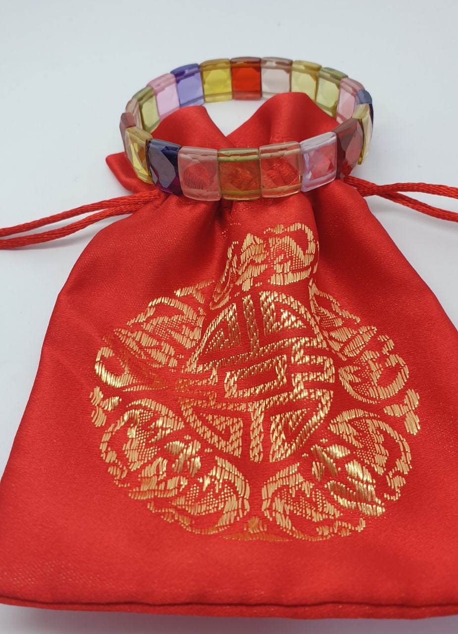 Pulsera elástica de circonitas cúbicas multicolor con cuentas facetadas de 11 x 9 mm. Proveedor de joyas con cuentas de doble perforación. Poder curativo.