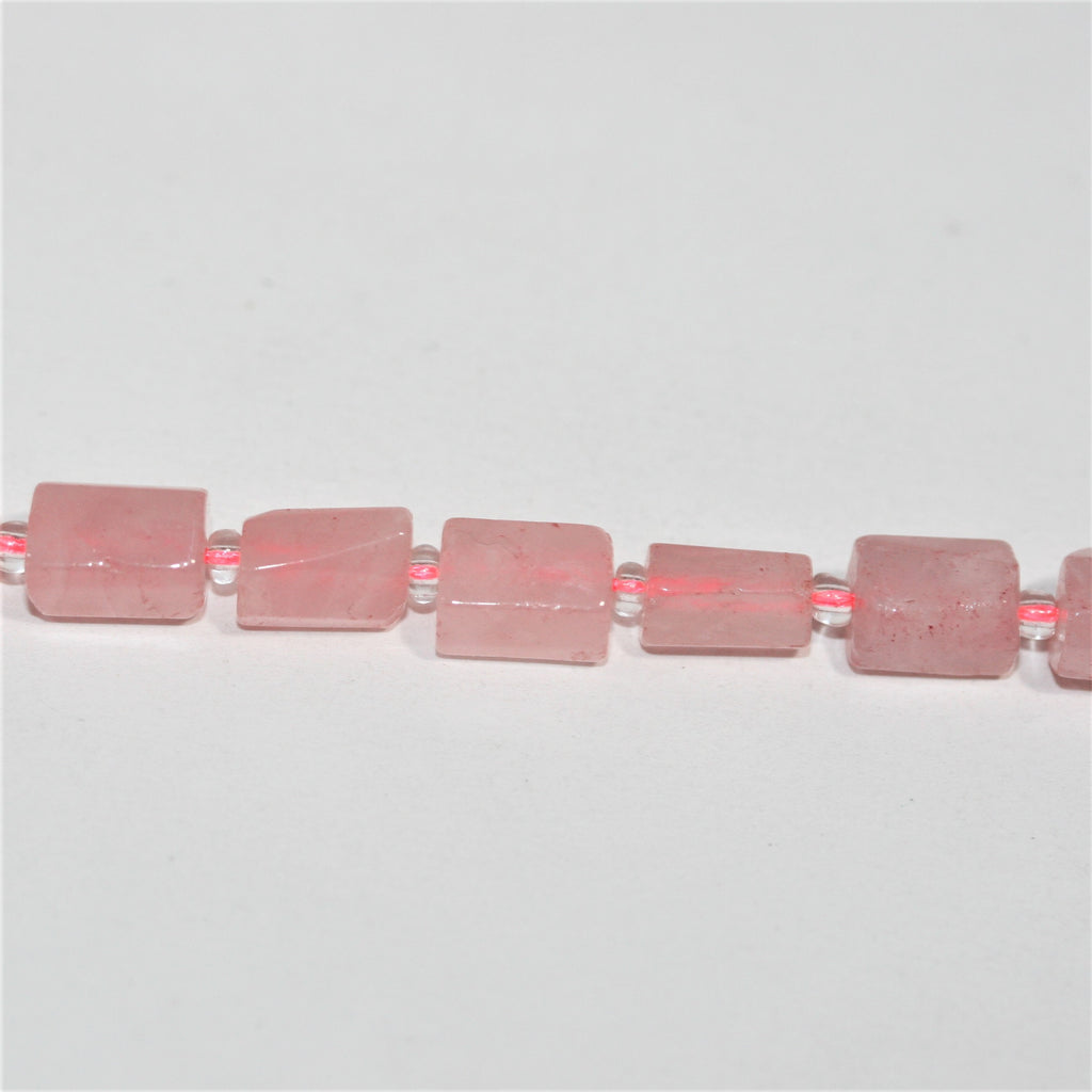 Cuentas de cuarzo rosa facetadas de 16" (10 x 7 mm). Longitud aproximada: 40 cm.