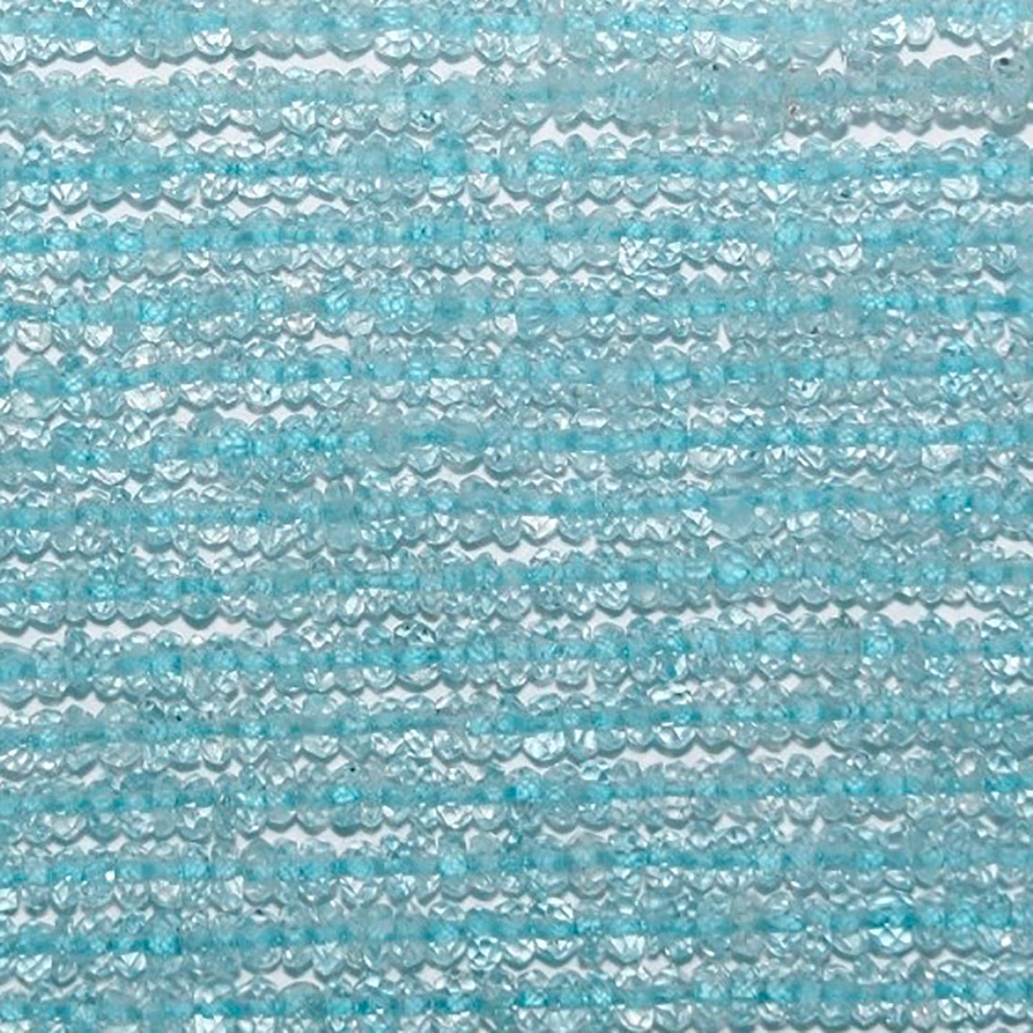 14" St Blue Topaz Faceted Rondelle 2.5x1.5mm.-Strand 36cm