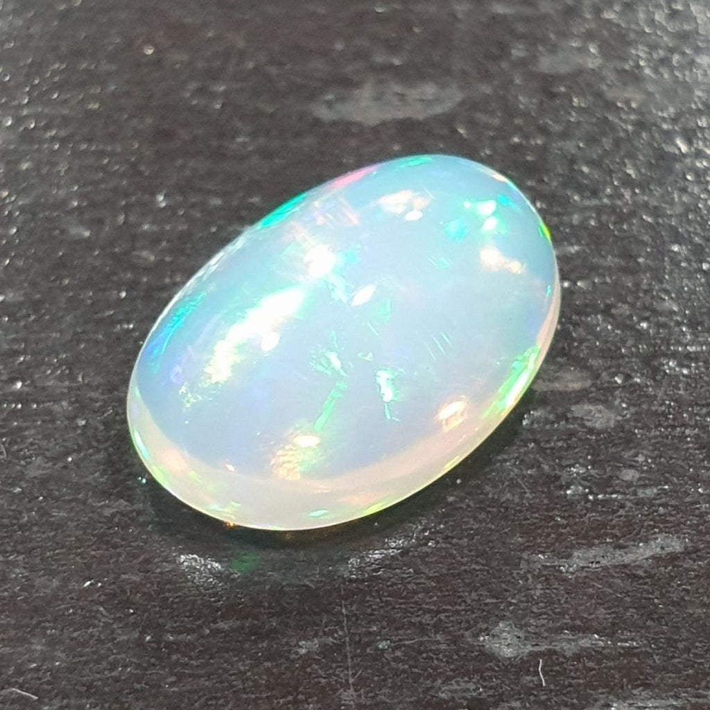 Cabochon ovale opale éthiopienne AAA 12,8x8,8 mm. (2,75 ct) Pierres précieuses naturelles extraites de la terre