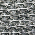 Cuentas ovaladas retorcidas facetadas de cuarzo cristal de roca de 16" (13 x 7 mm). Longitud aproximada: 40 cm.