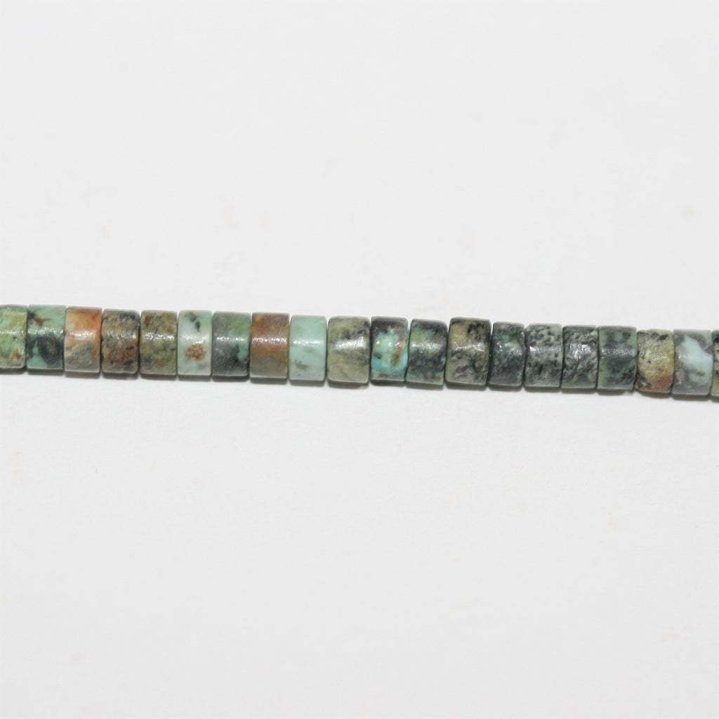 Perles disques lisses en turquoise africaine St 15" 4x2mm.- Brin 39cm.