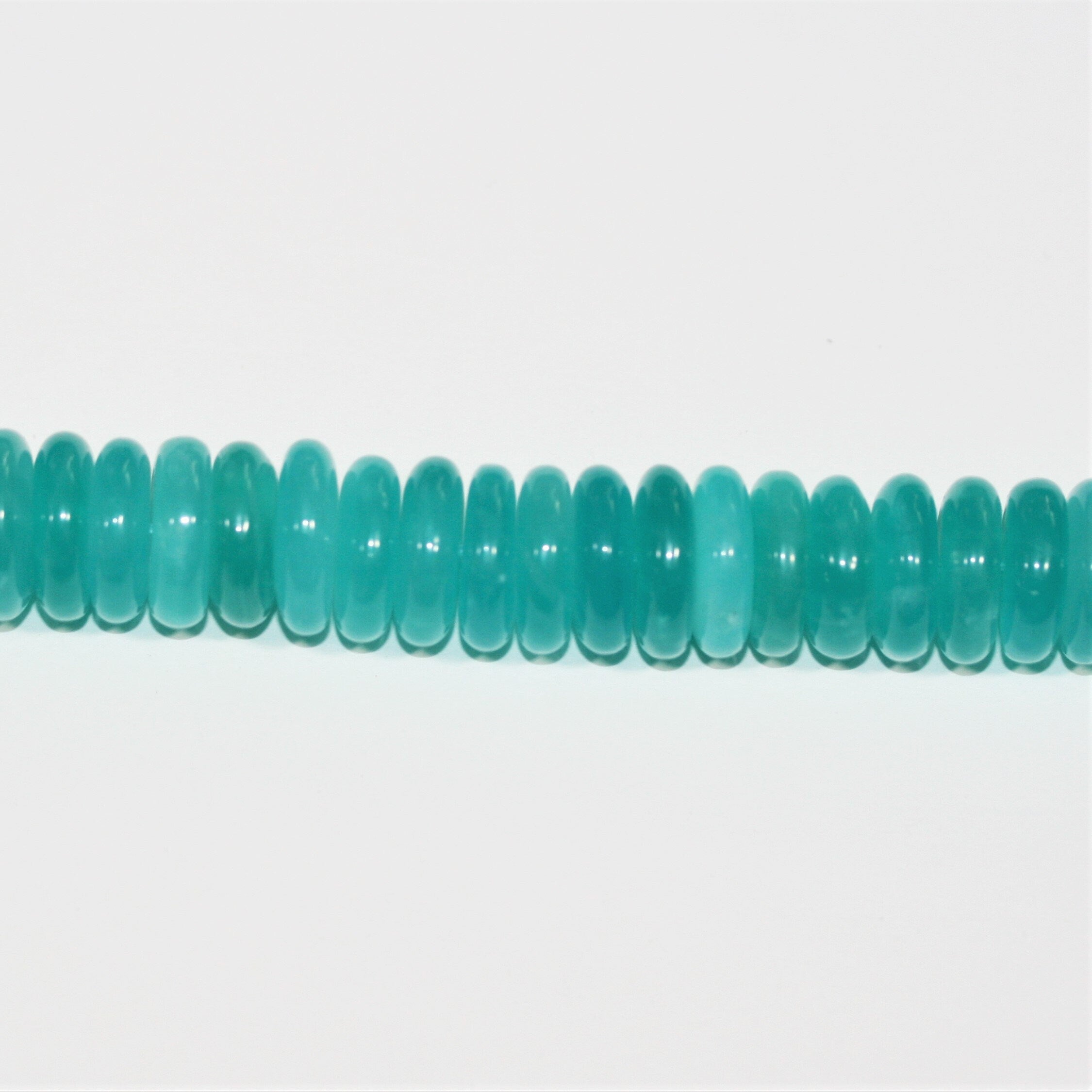Perles rondelles lisses en amazonite St de 15 pouces (14 x 4 mm). Longueur approximative du fil : 39 cm.
