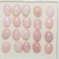Lote de 20 cabujones ovalados de ópalo rosa de 6 x 4 mm. (20 uds.).