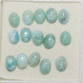 Lote de 15 cabujones ovalados de Larimar de 7 x 5 mm. (15 uds.).